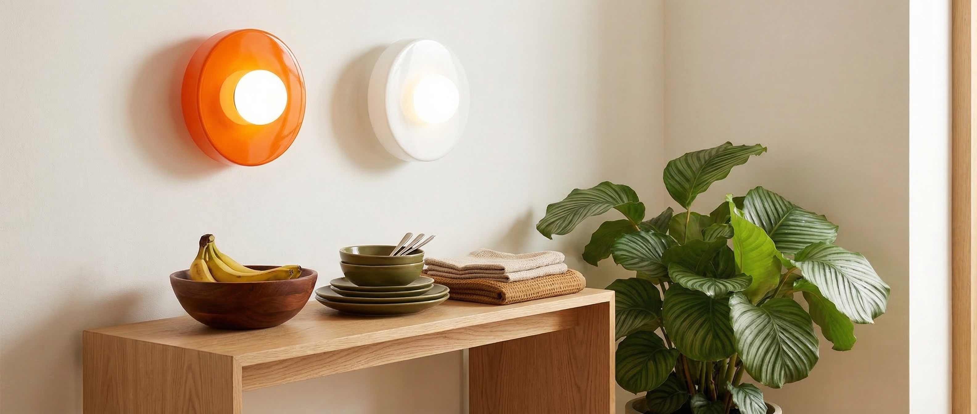 Glasenti Halo Disc Orb ceiling and wall lamp in a bedroom scene