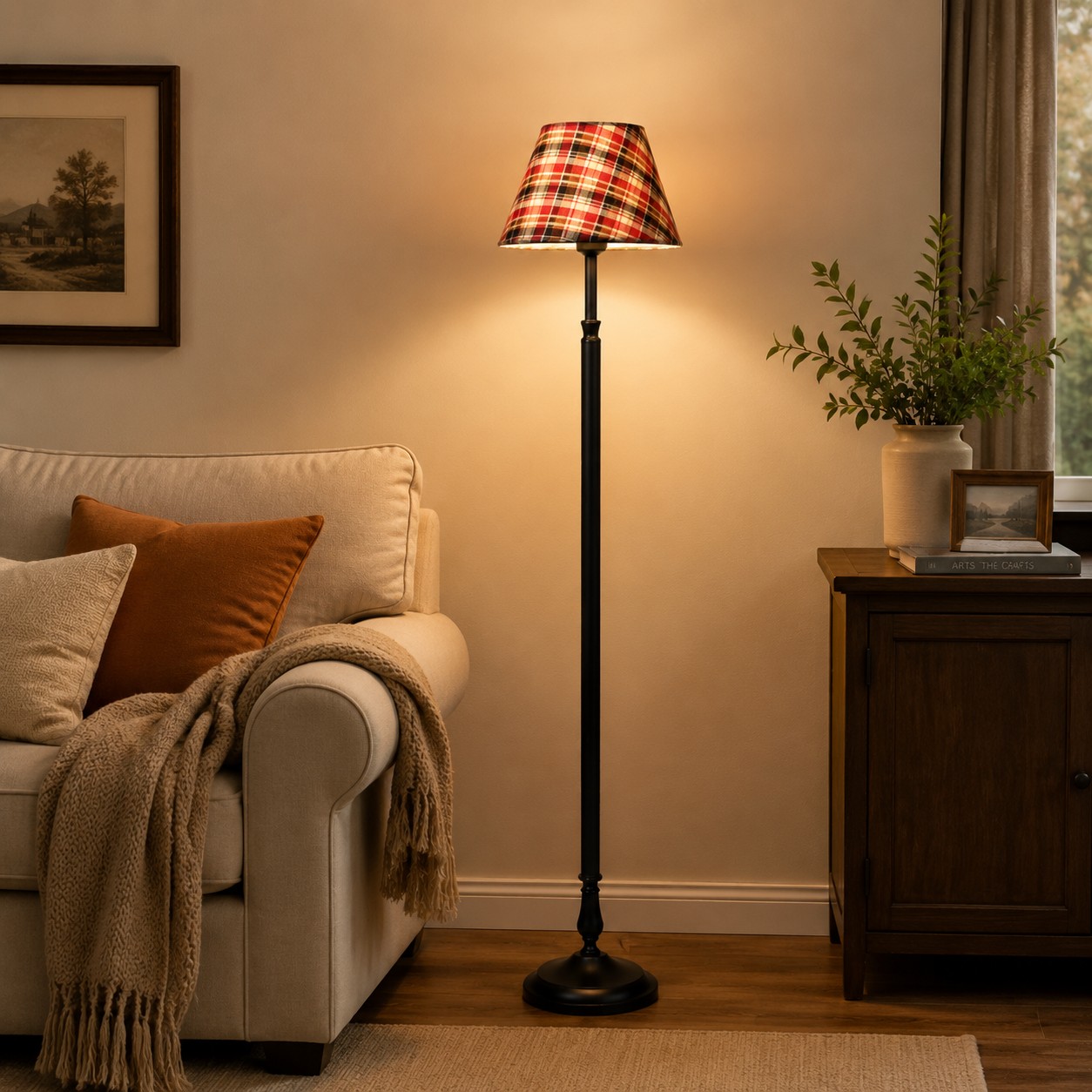 Black iron floor lamp illuminating a calm bedroom corner